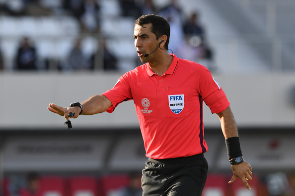 SHARJAH, UNITED ARAB EMIRATES - JANUARY 21: Referee Ravshan irmatov of Uzbekistan gestures during the AFC Asian Cup round of 16 match between Japan and Saudi Arabia at Sharjah Stadium on January 21, 2019 in Sharjah, United Arab Emirates. (Photo by Etsuo Hara/Getty Images)